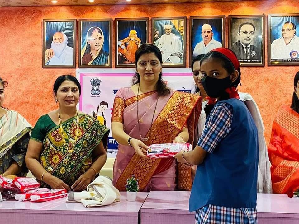 Schoolgirl receiving a hygiene pack